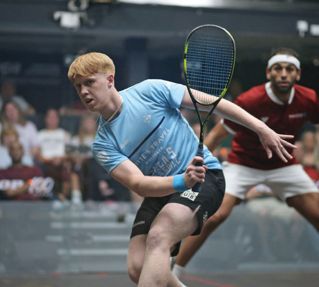 A man partaking in squash