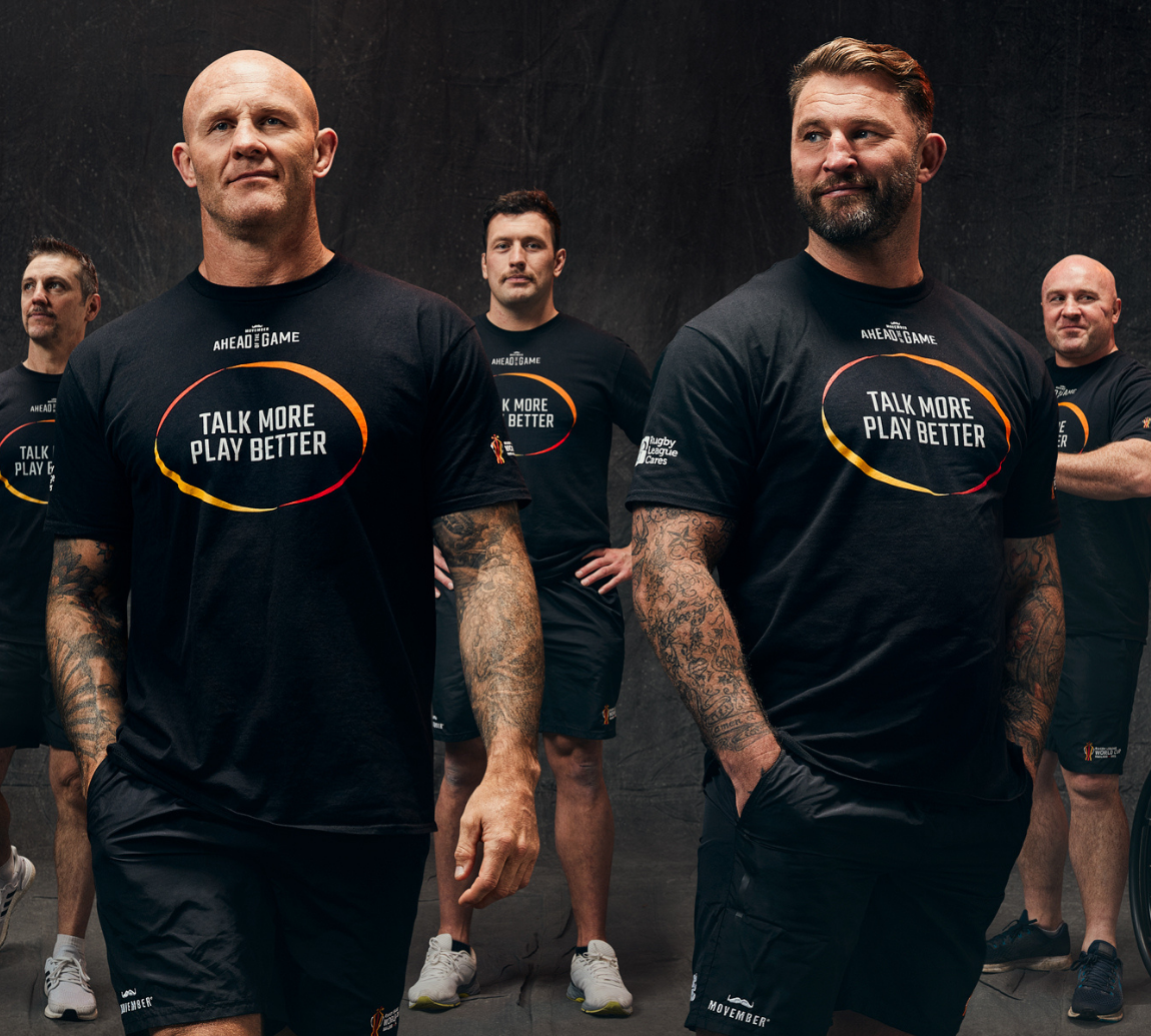 A group of people wearing a t shirt advertising the company.