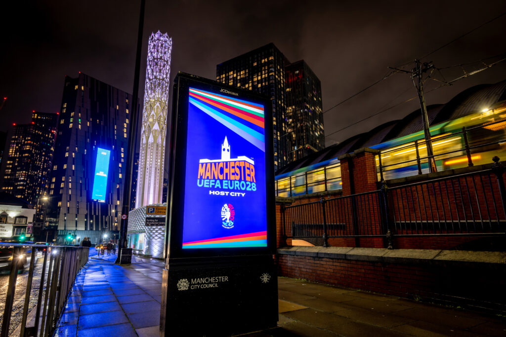 UEFA Euro 2028 promo screens in Manchester.
