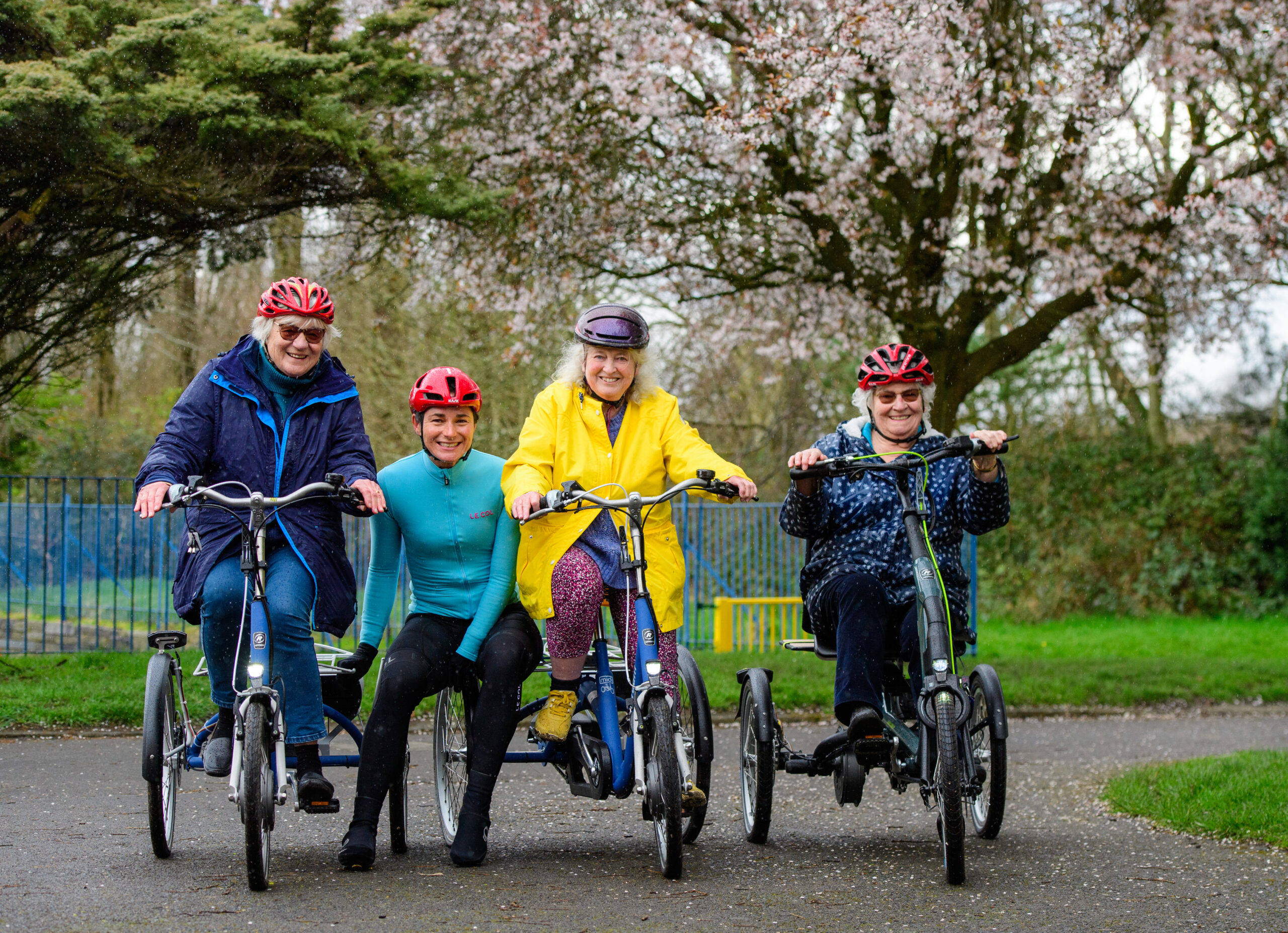 Women on trikes and bicycles