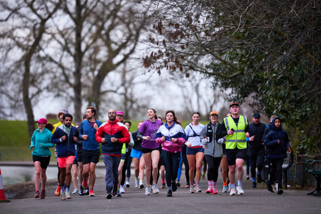 Group running outdoors in park