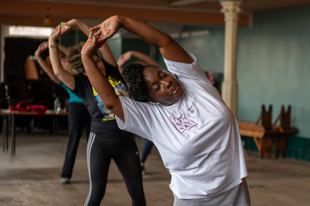 Group of women stretching in studio
