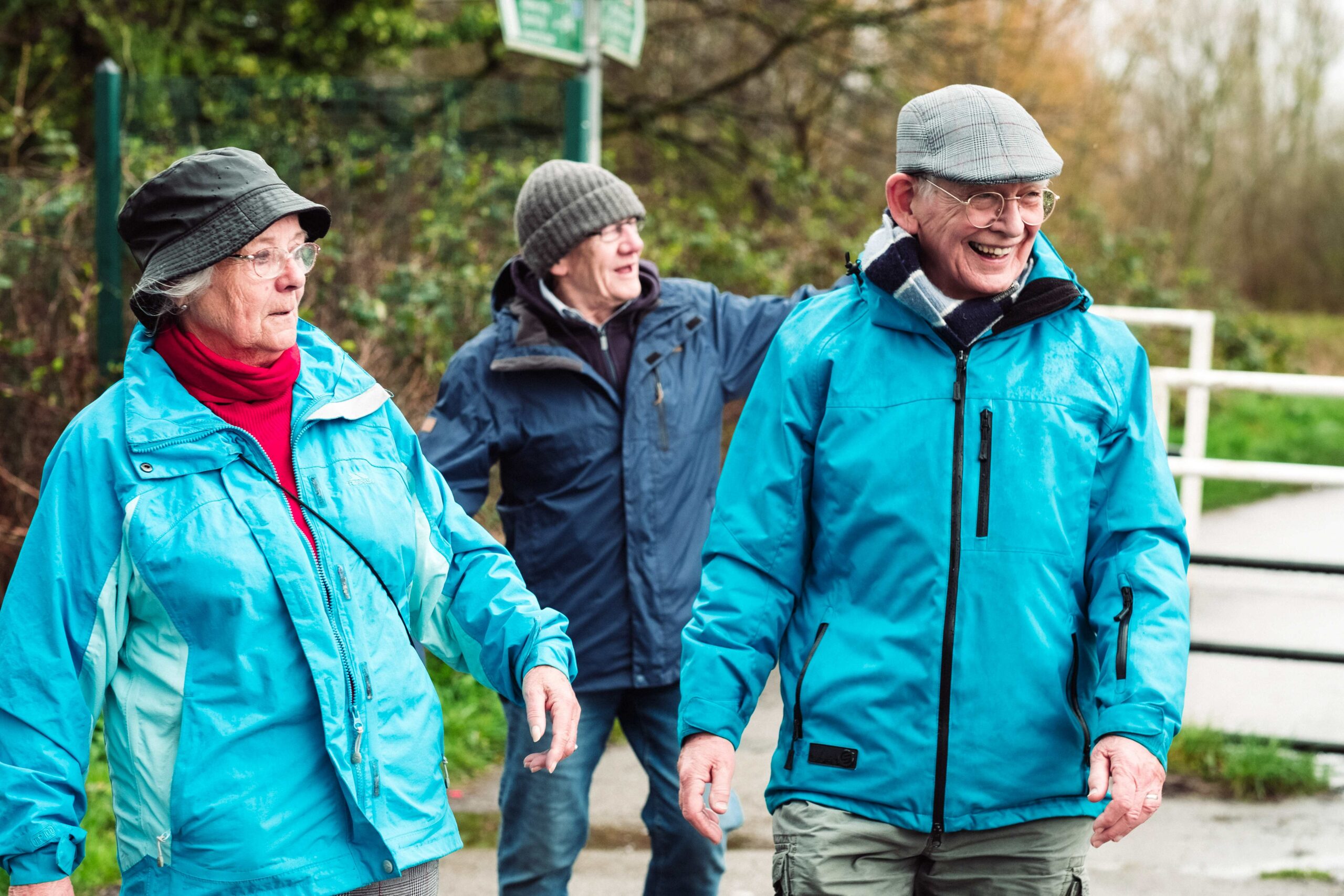 Group of older people outdoors walking