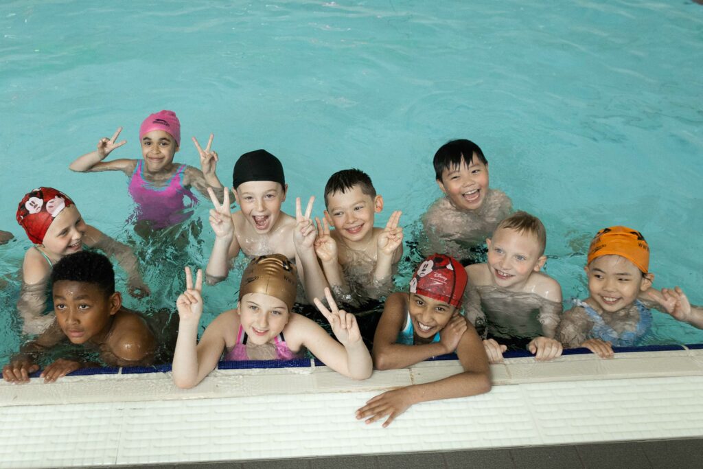 Kids swimming in a pool