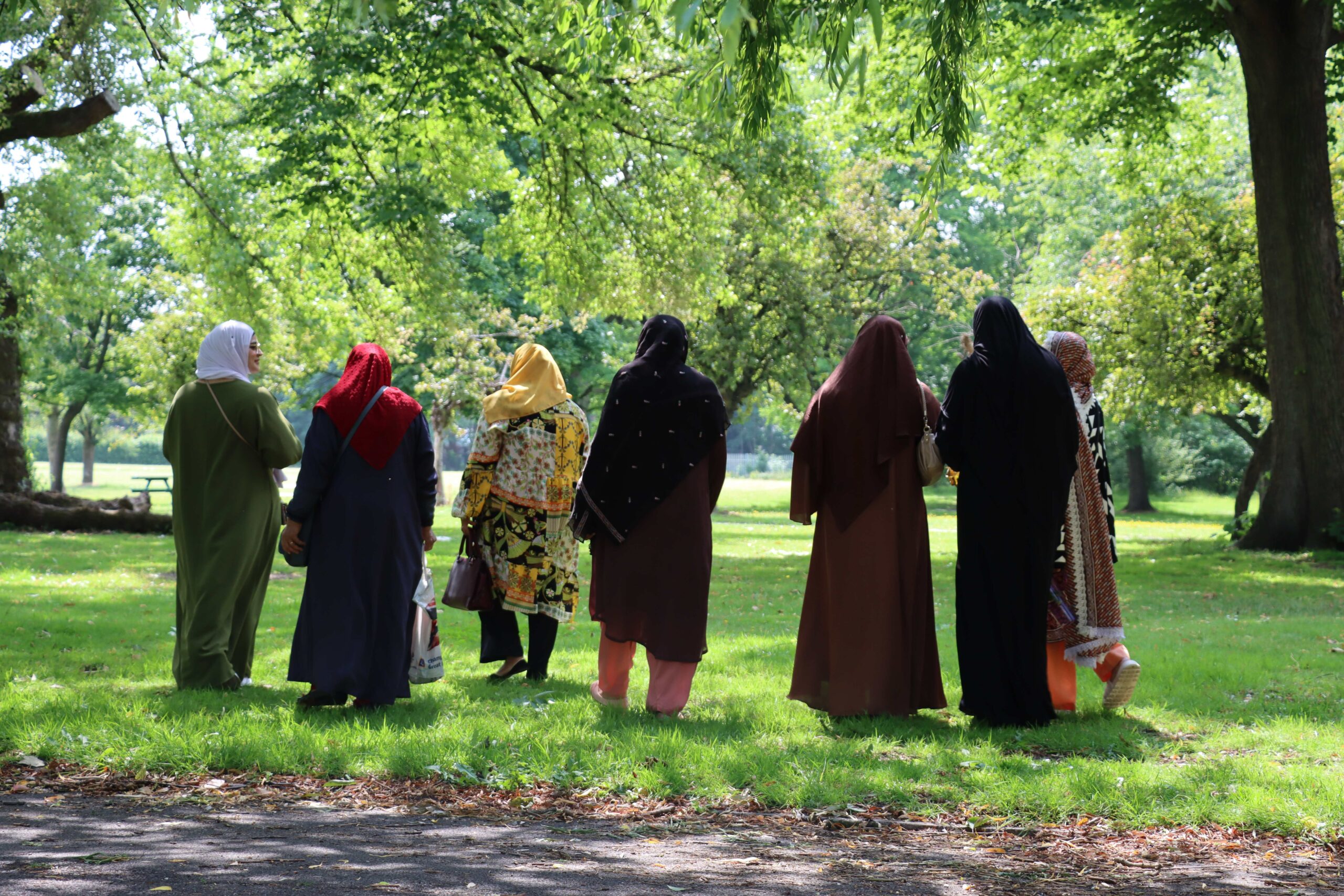 Group of muslim women walking in a park